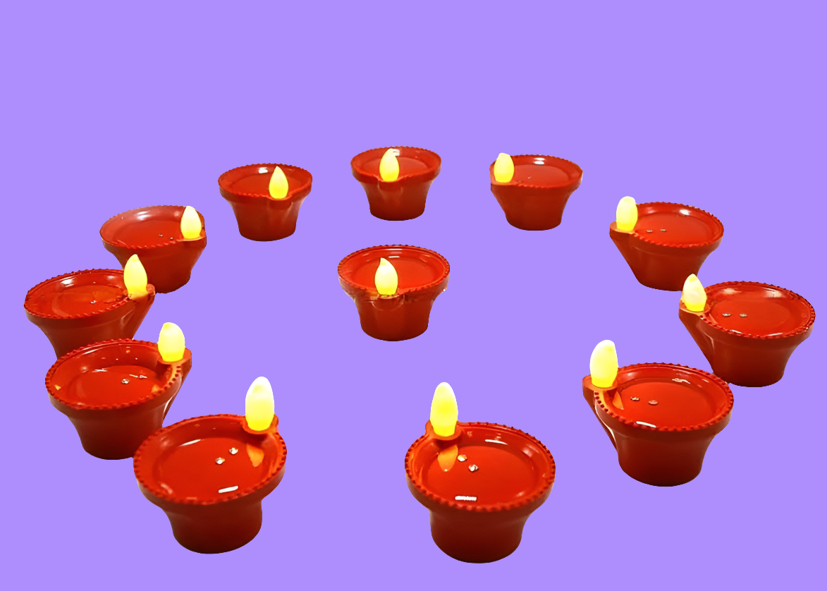 Red candles with yellow wicks arranged in a circular pattern on a purple background